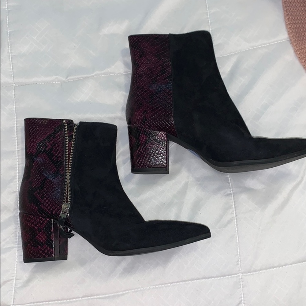 Michael Kors booties . Black w/ dark purple detail